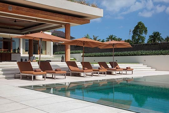 Sun loungers by the pool